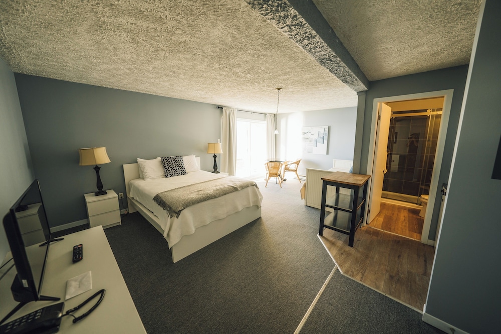 Chambre standard RDC, section MOTEL, un lit queen, cuisinette photo 1