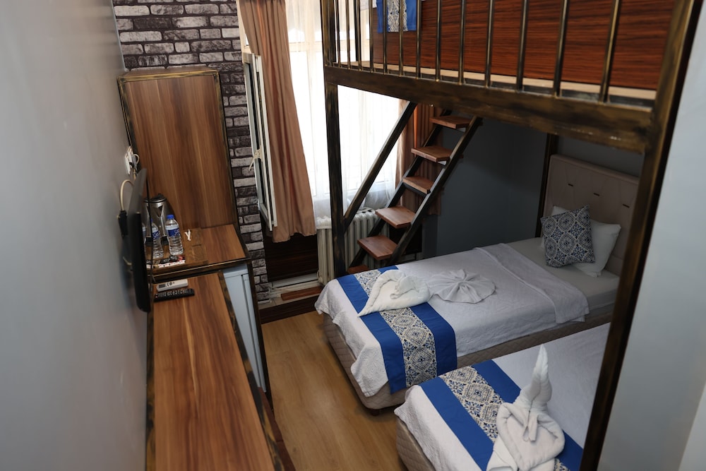 Deluxe Triple Room - Photo 7