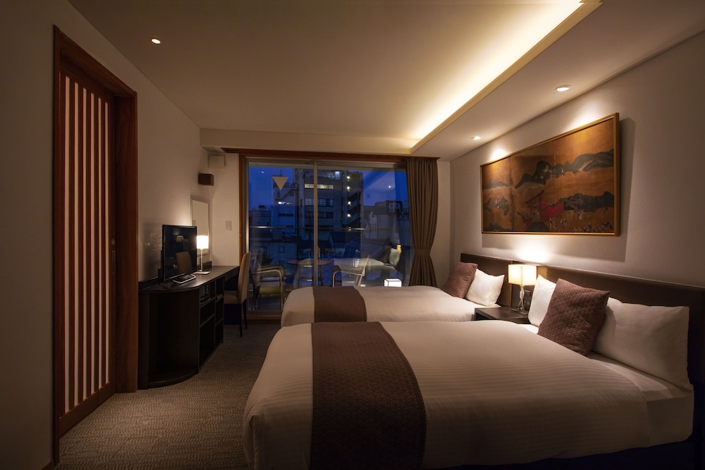 Premium Twin Room - Photo 10