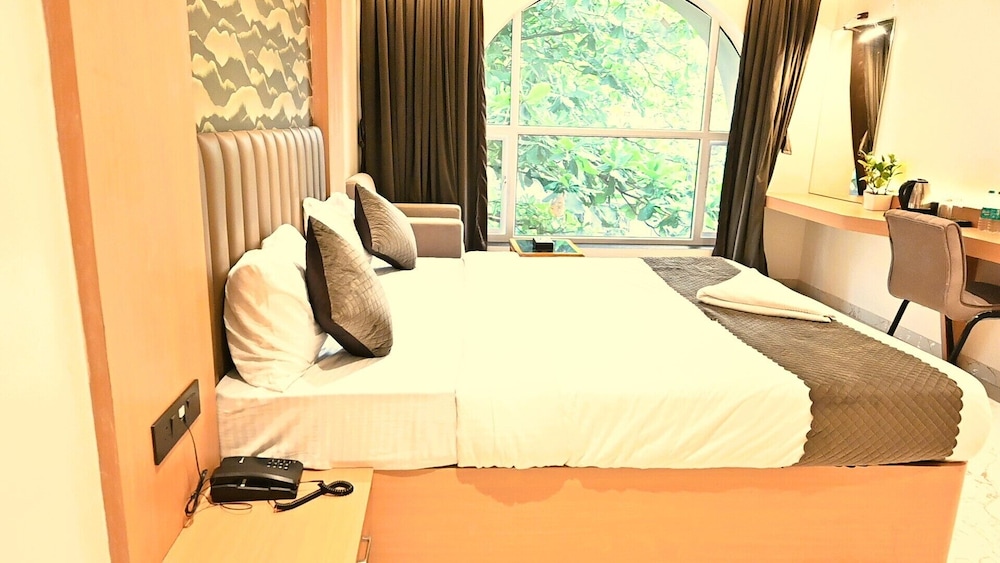 Deluxe Room - Photo 1