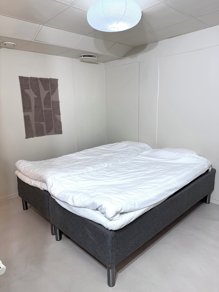 Smaller Twin Bed Room With a Bunk Bed. (No Windows)