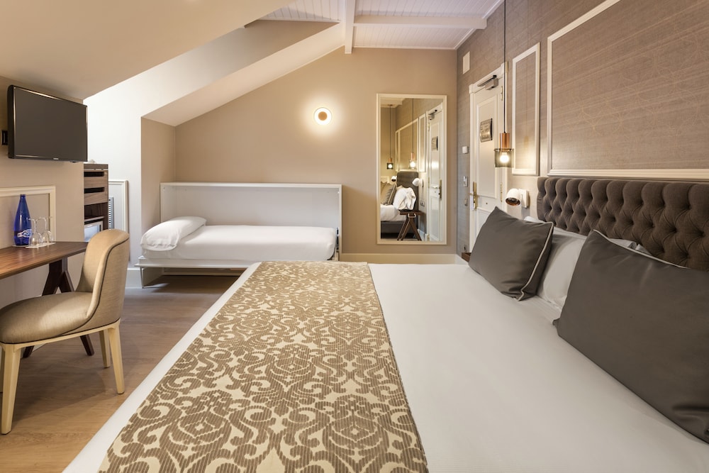 Habitación triple (2 adultos + 1 niño)