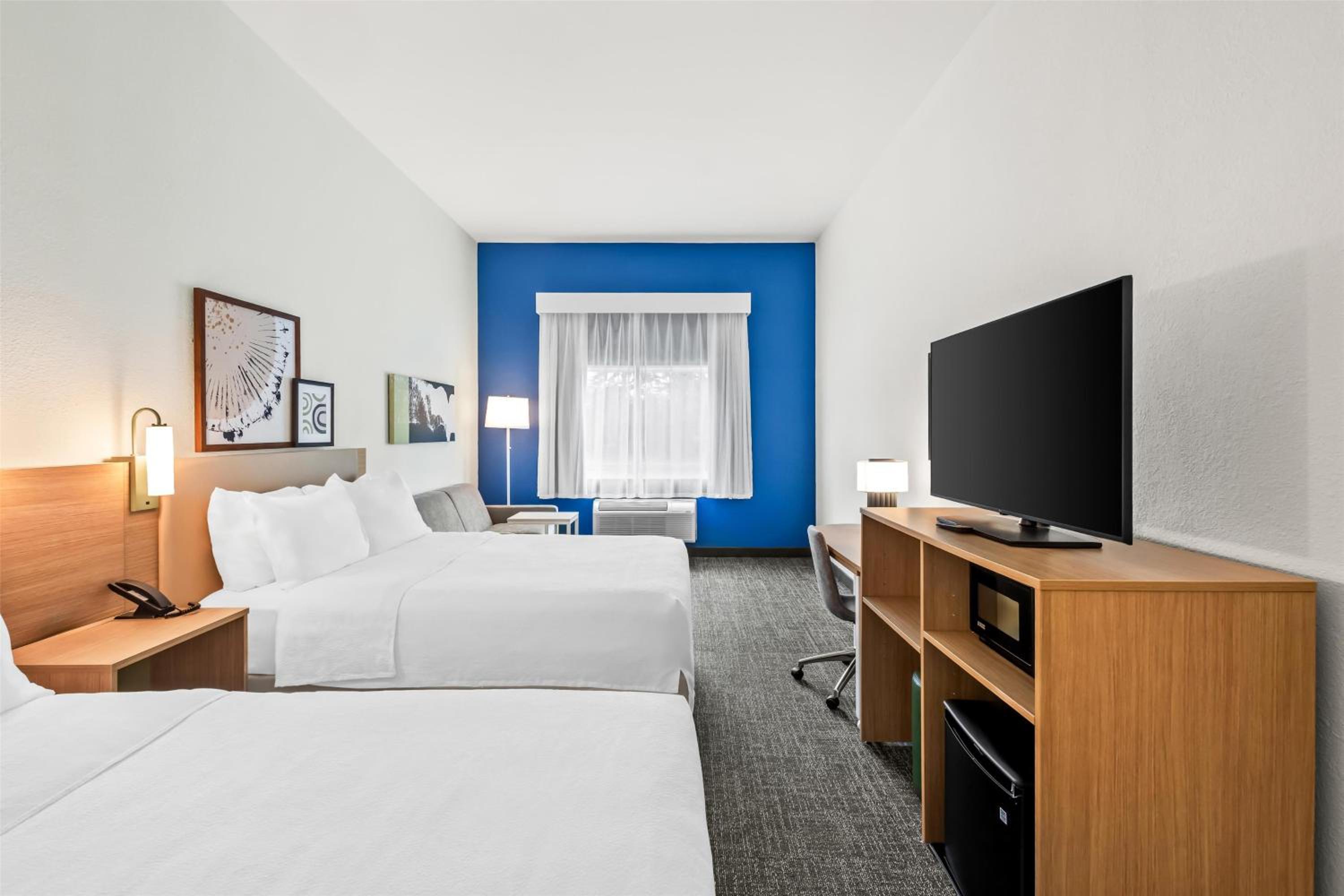 Queen Room with Two Queen Beds and Sofa Bed - Photo 1