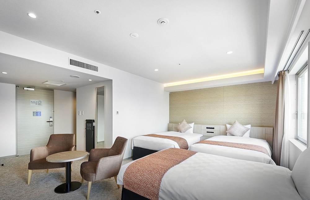 Wide Deluxe Triple Room, Smoking photo 1