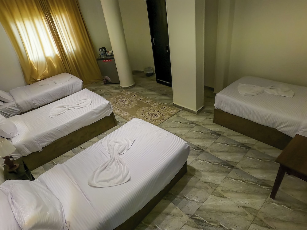 Economy Quadruple Room, Multiple Beds, City View photo 1