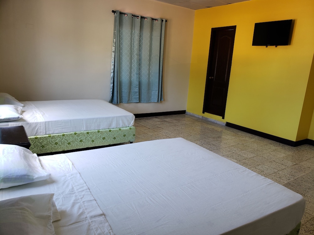 Basic Quadruple Room, Multiple Beds, Private Bathroom, Courtyard Area photo 3