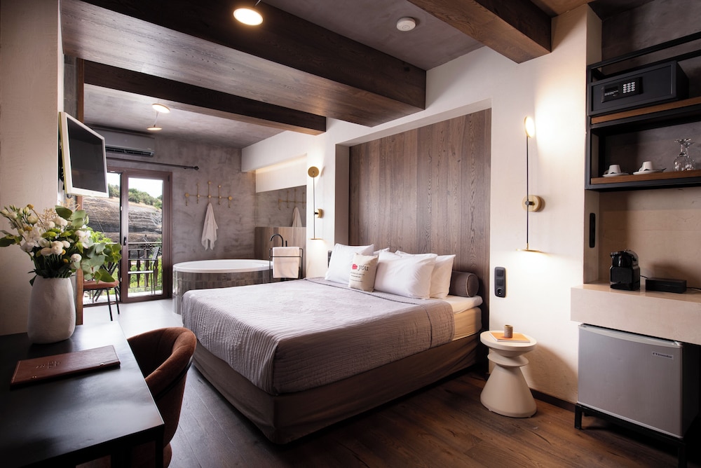 The Hot Tub Suite with Fireplace & Steam Shower photo 1