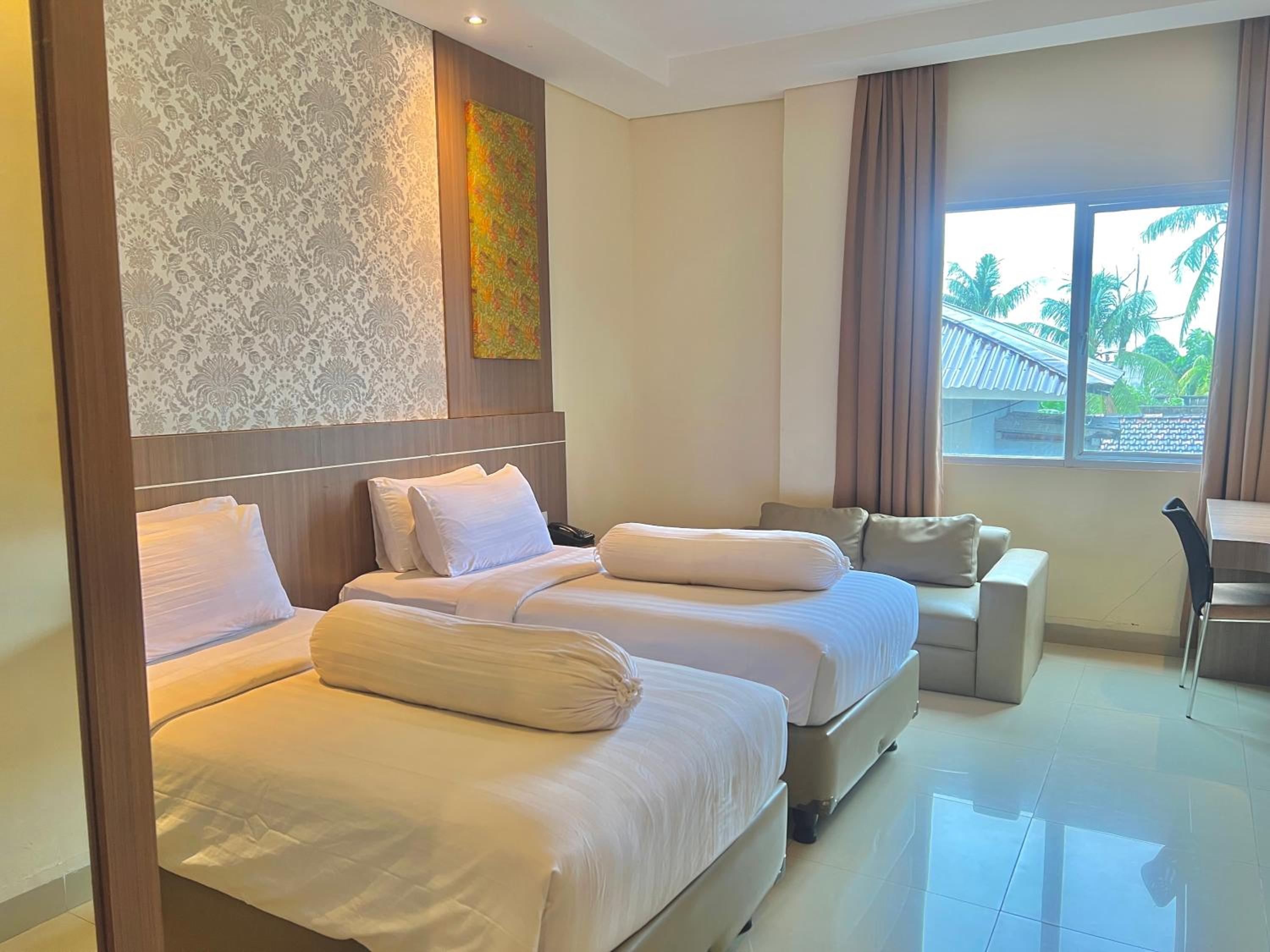Deluxe Twin Room - Photo 2