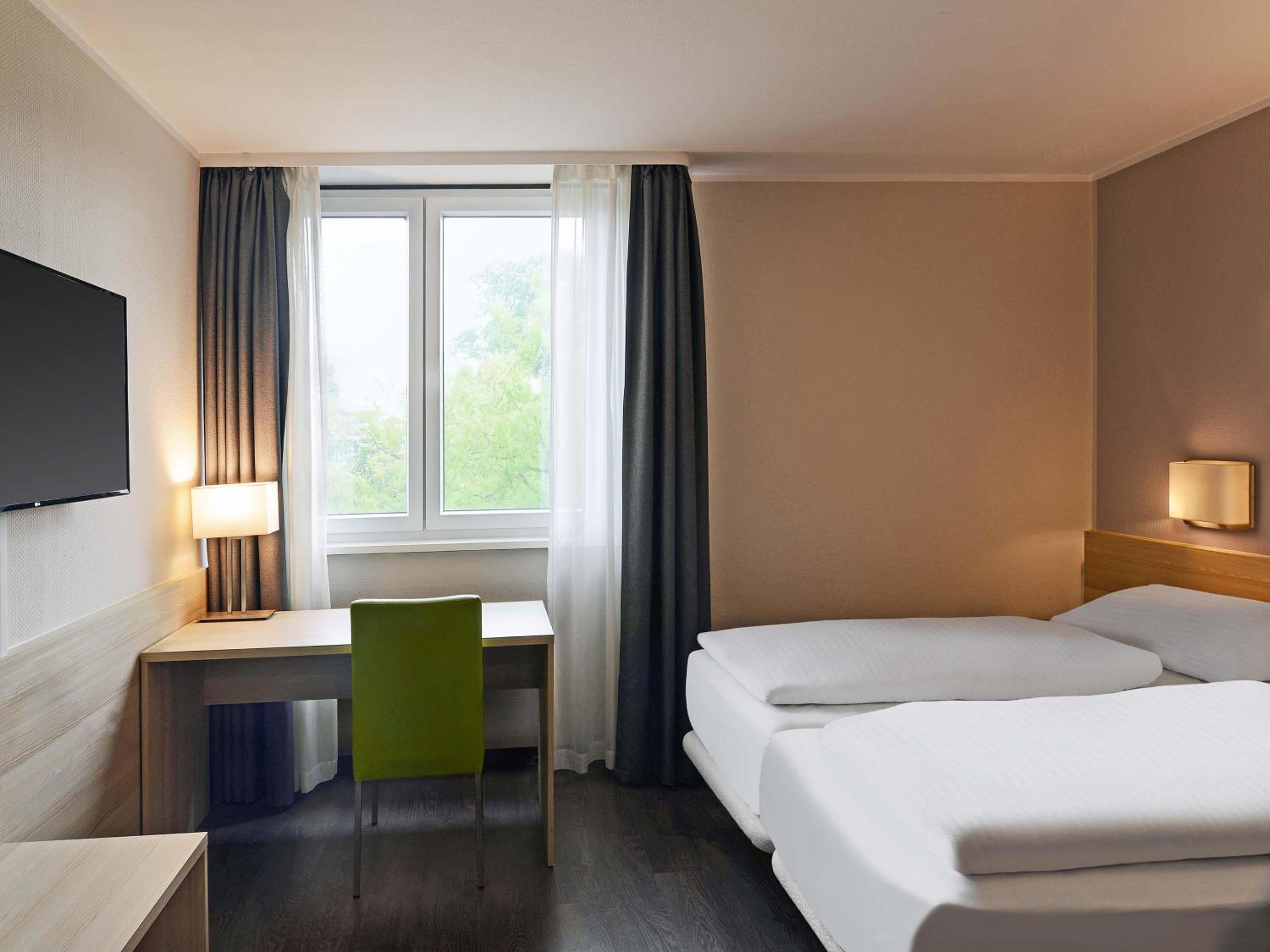 Twin Room - Photo 1