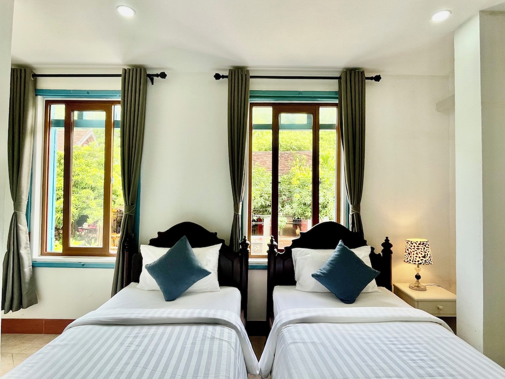 Room with two single beds, City view - Photo 1