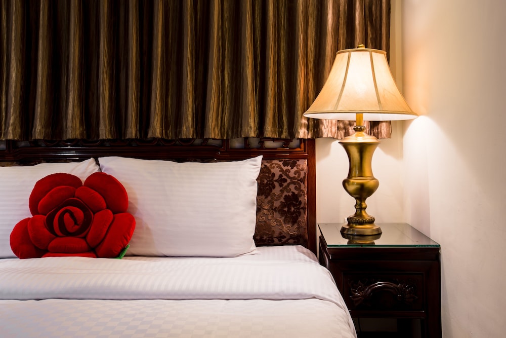 Deluxe Quadruple Room, 2 Queen Beds photo 2