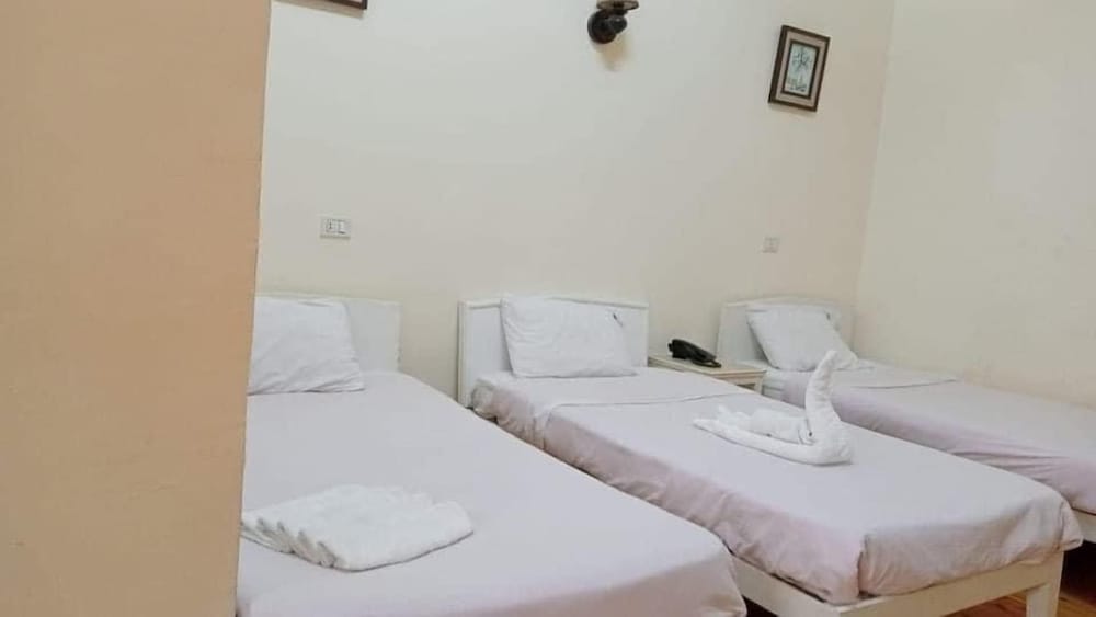 Deluxe Triple Room, Multiple Beds, City View