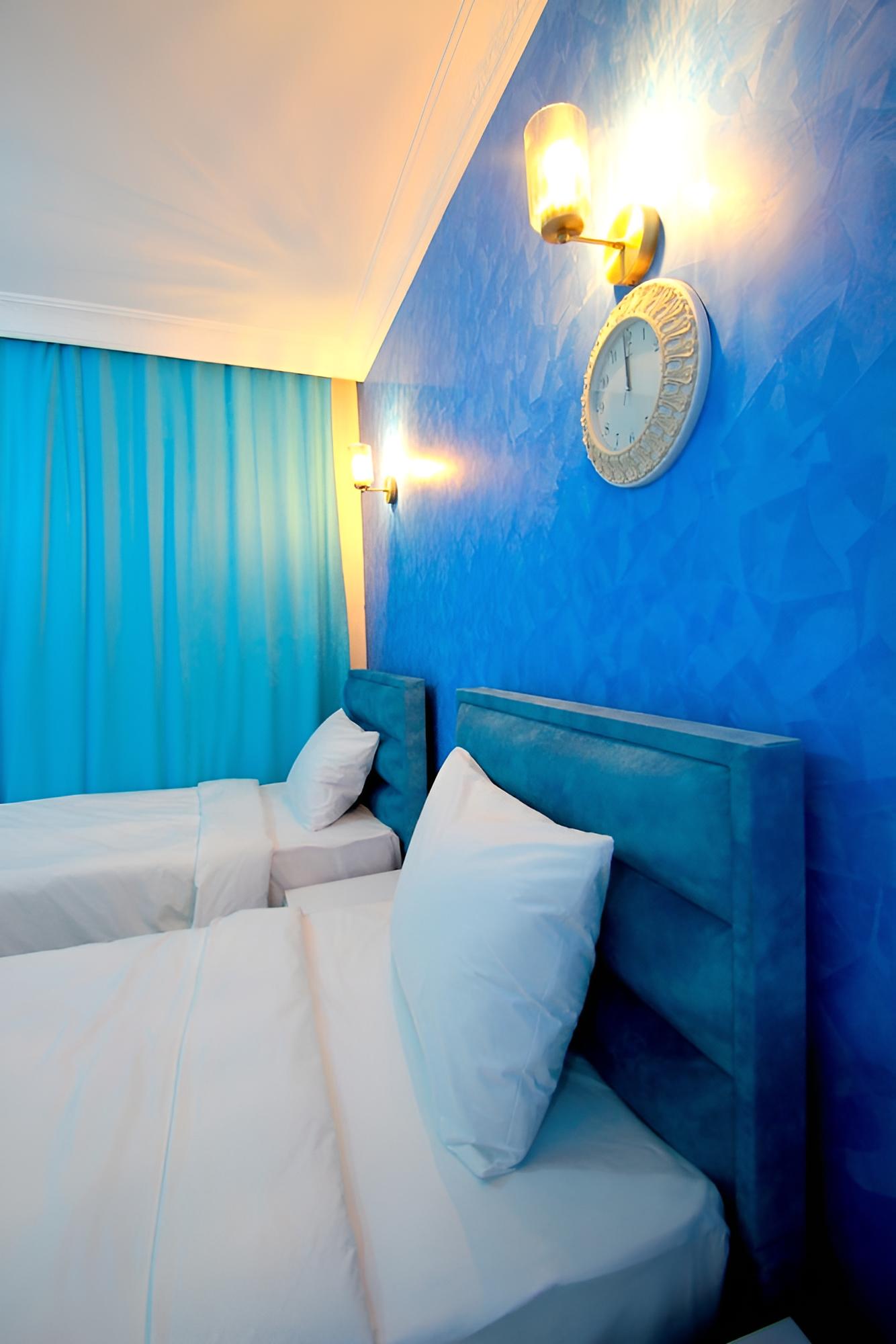 Deluxe Triple Room, 1 Bedroom, City View, Garden Area photo 2