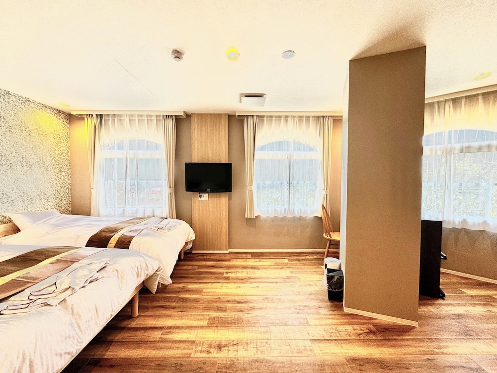 Deluxe Triple Room - Photo 10