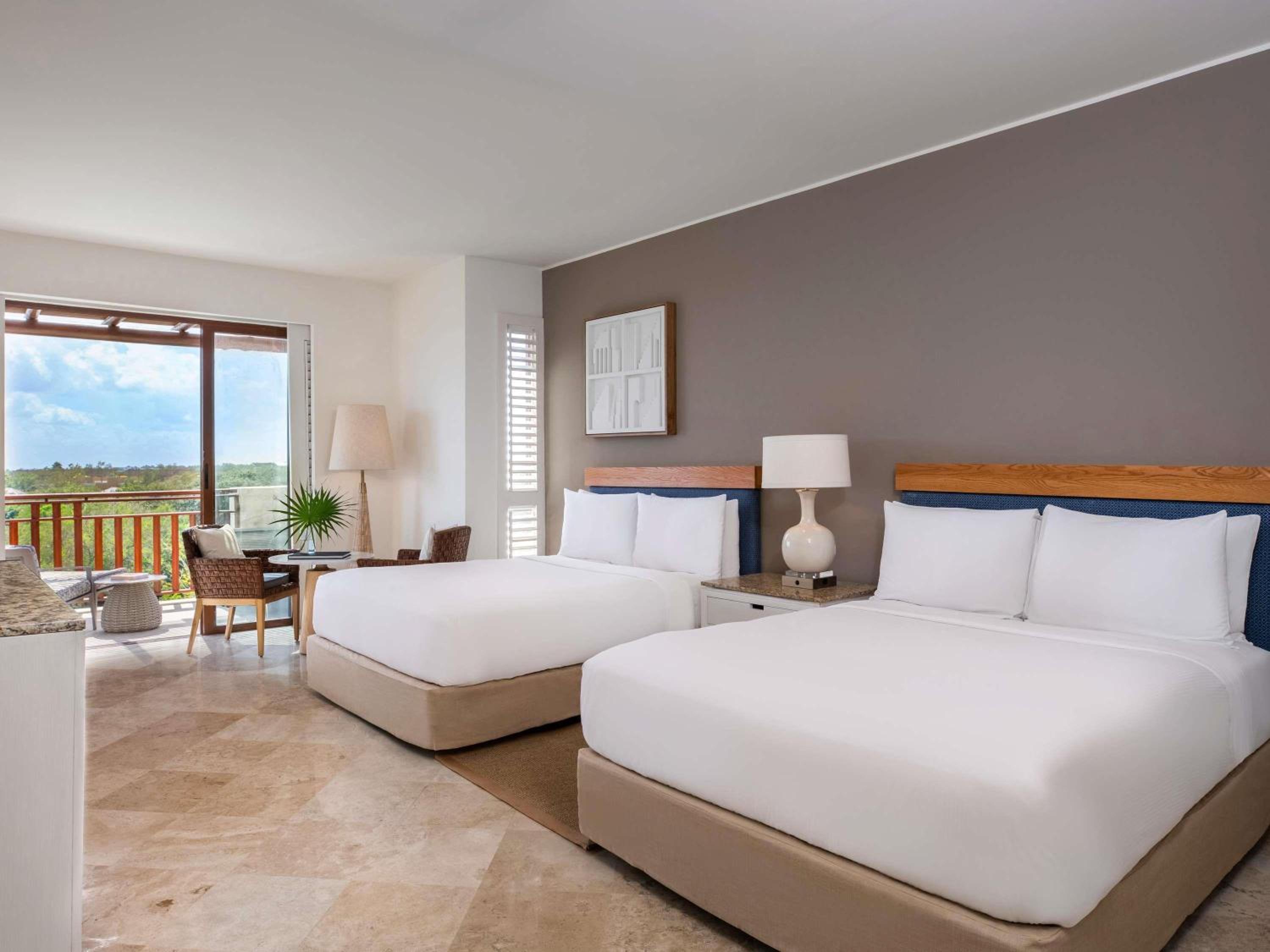 Family Connecting Garden Plus King Room with Two Queen Beds