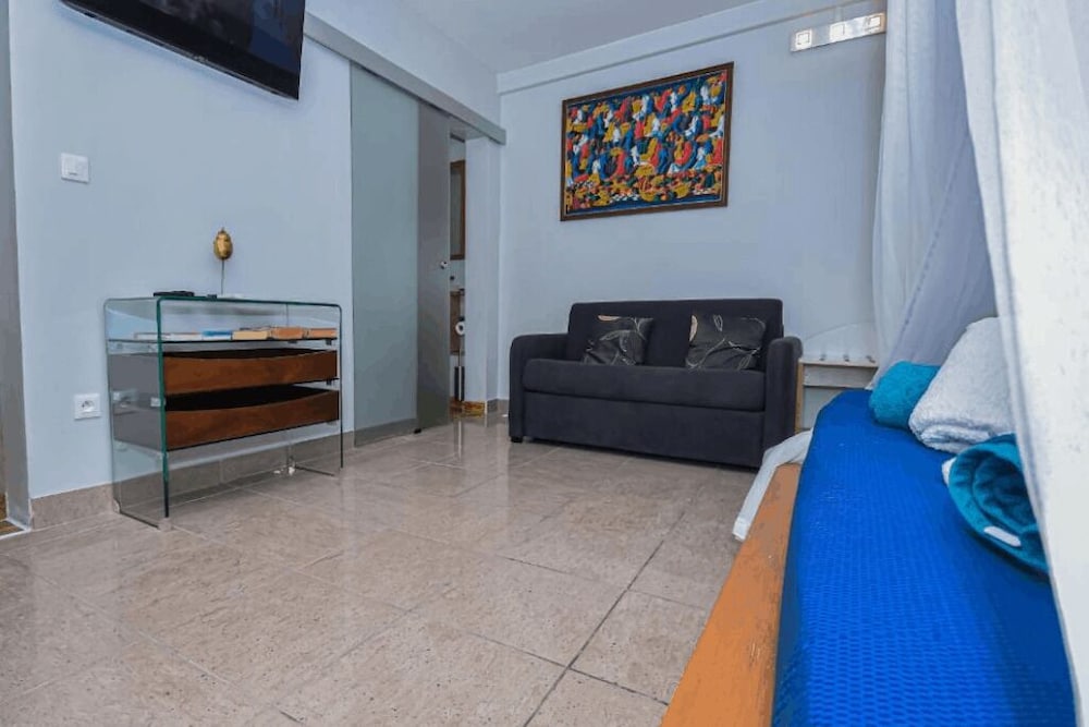 Chambre Double Confort (Carambole), plusieurs lits, salle de bains privée, vue jardin photo 2