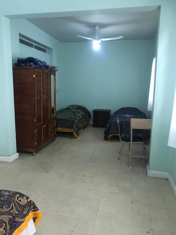 Economy Quadruple Room - Photo 7