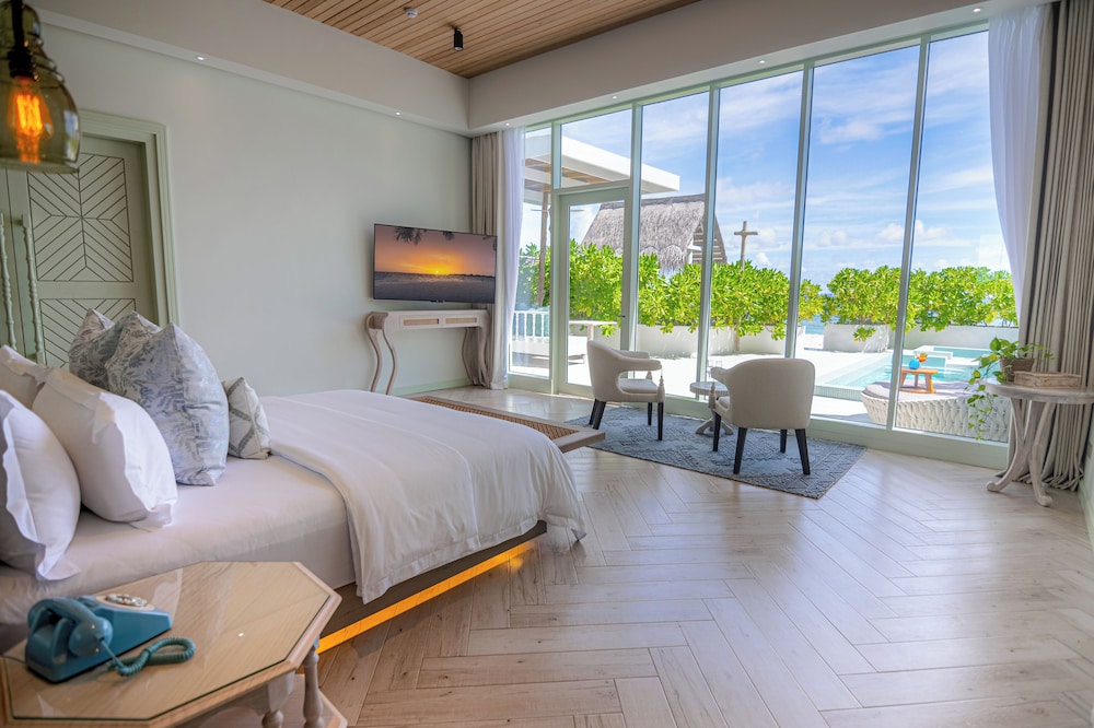 Sunset Beach Pool Suite - 50% off on Return Transfers for min 3 night stay from 1 May-31 Oct'25