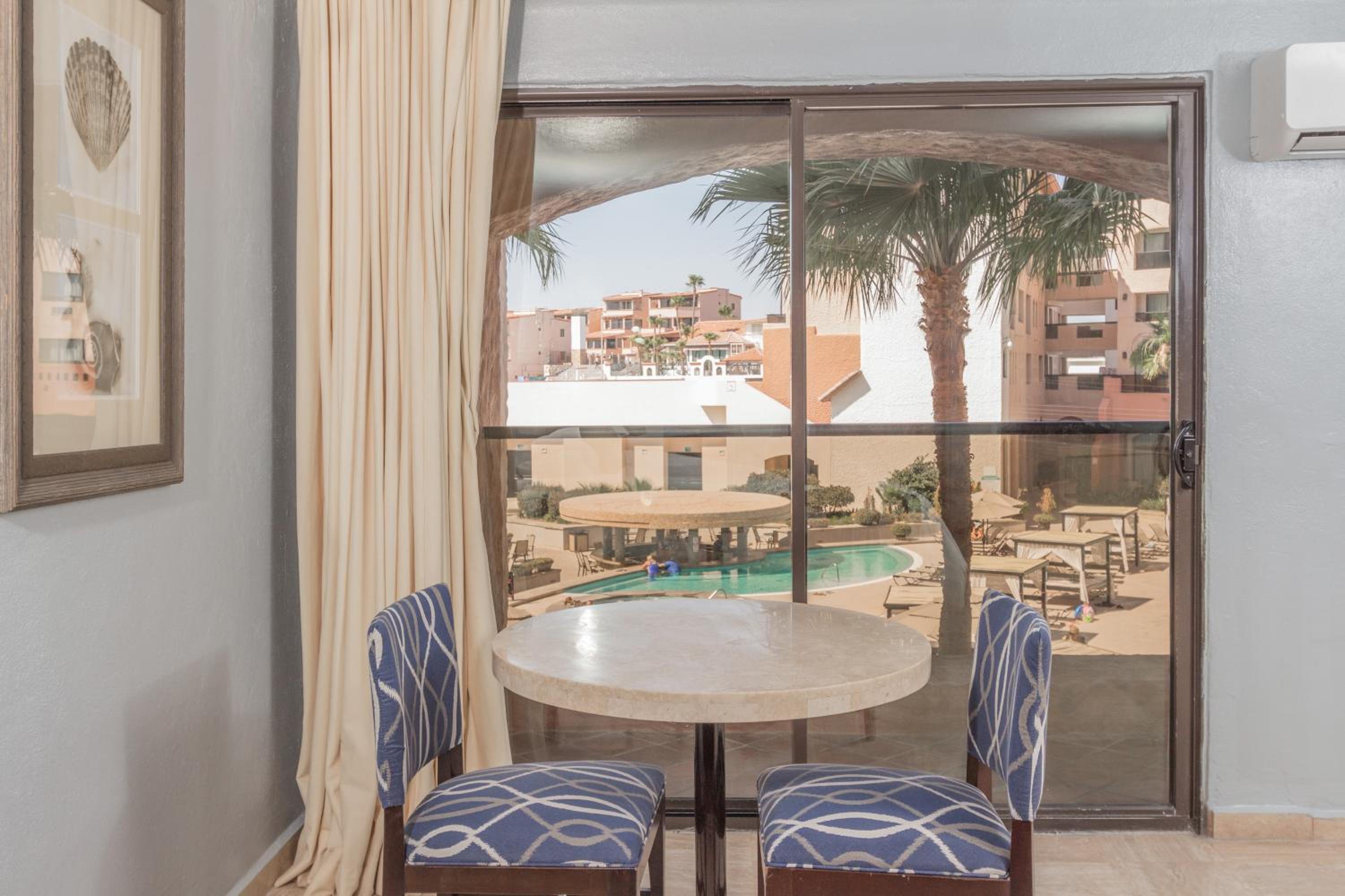 Deluxe Room Pool View with Balcony 2 Queen Beds - Photo 2