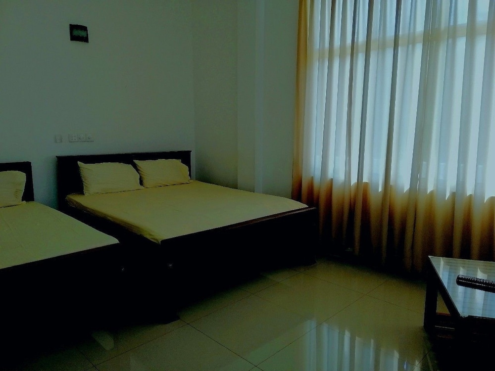 Triple Room, Multiple Beds, Non Smoking photo 1