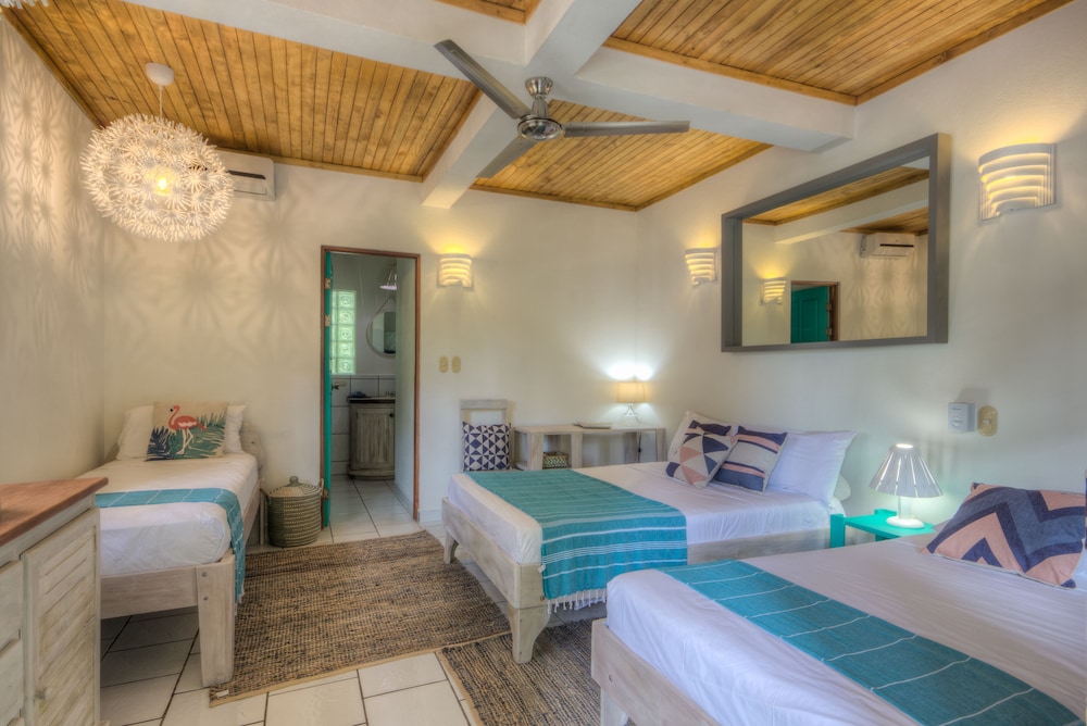 Deluxe Room, Multiple Beds, Garden View (Ground Floor)