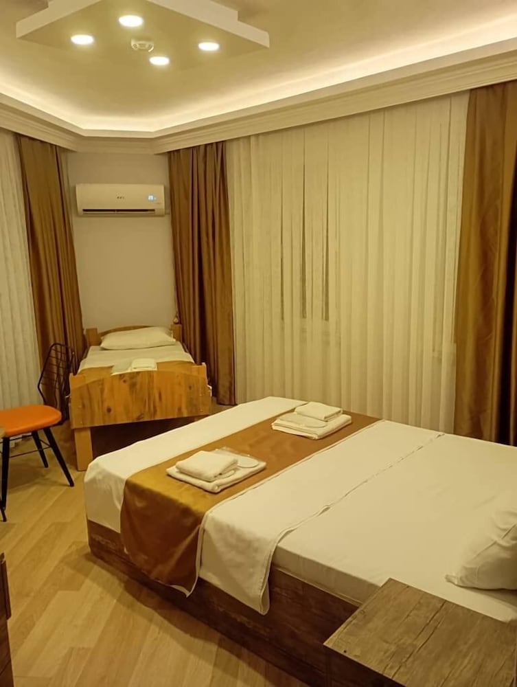 Family Double or Twin Room, Partial Sea View, Sea Facing photo 1