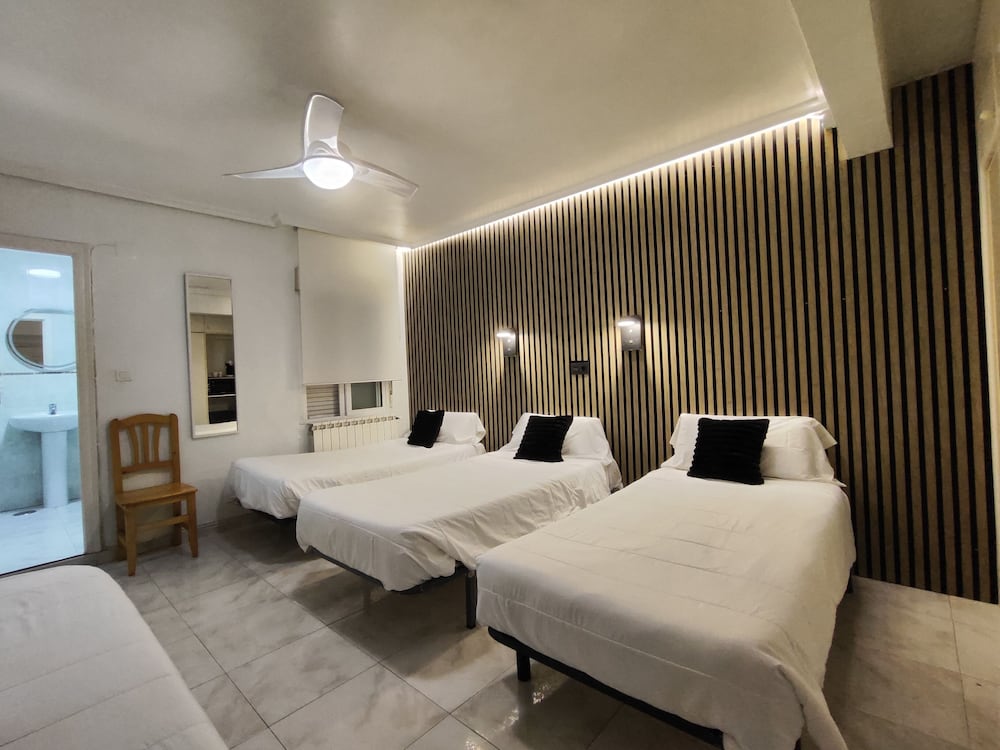 Habitación Cuádruple, 1 Dormitorio, Baño Privado, Área de Patio