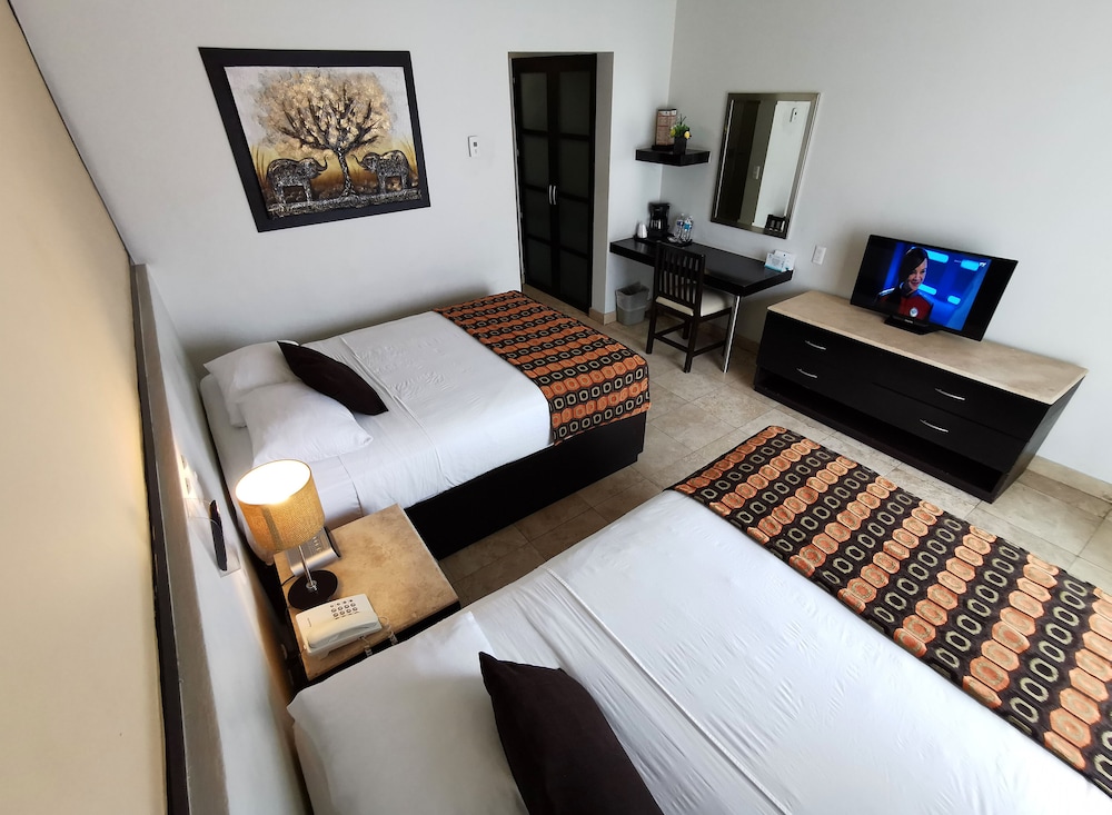 Room, 2 Double Beds, Partial Ocean View - Photo 2
