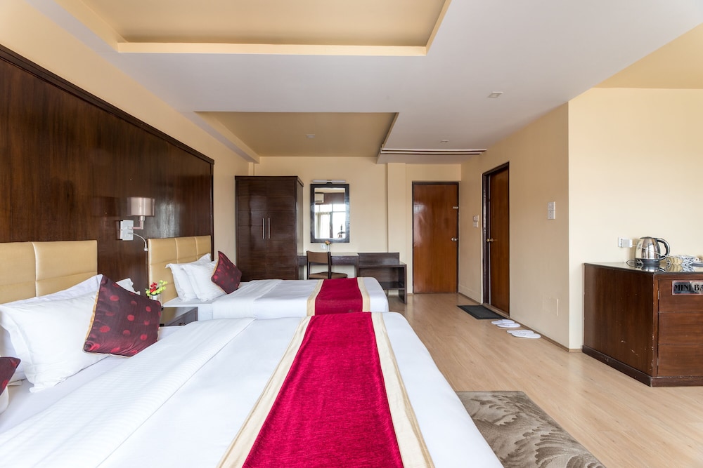 Deluxe Triple Room - Photo 10