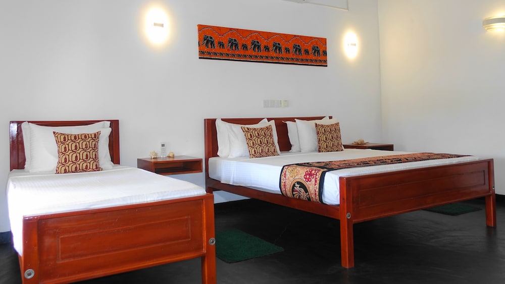 Deluxe Triple Room, Balcony, Garden View photo 2