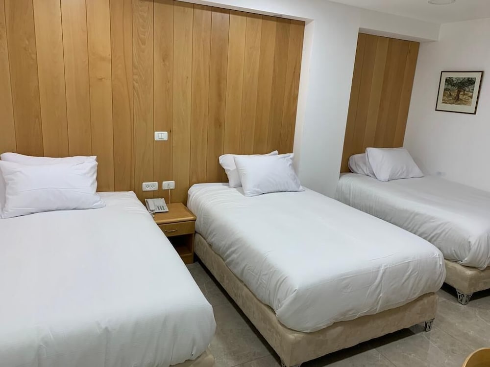 Premium Triple Room - Photo 11