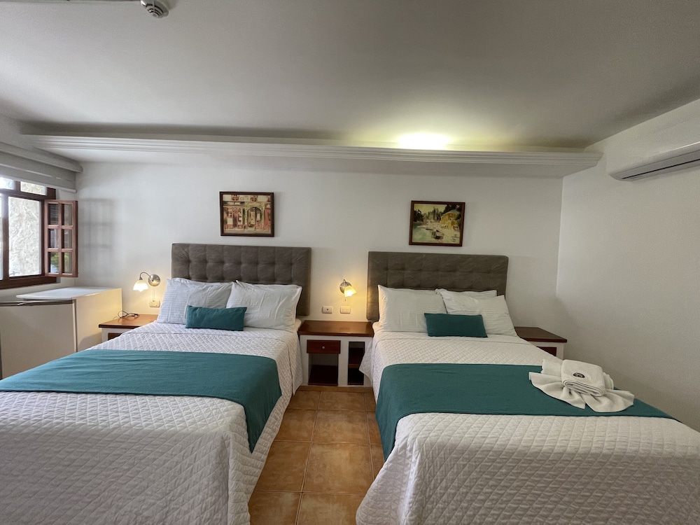 Standard Triple Room, 2 Double Beds, Refrigerator, Poolside