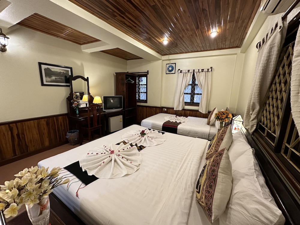 Deluxe Triple Room - Photo 12