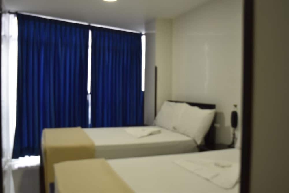 Deluxe Quadruple Room, 2 Double Beds, City View photo 1