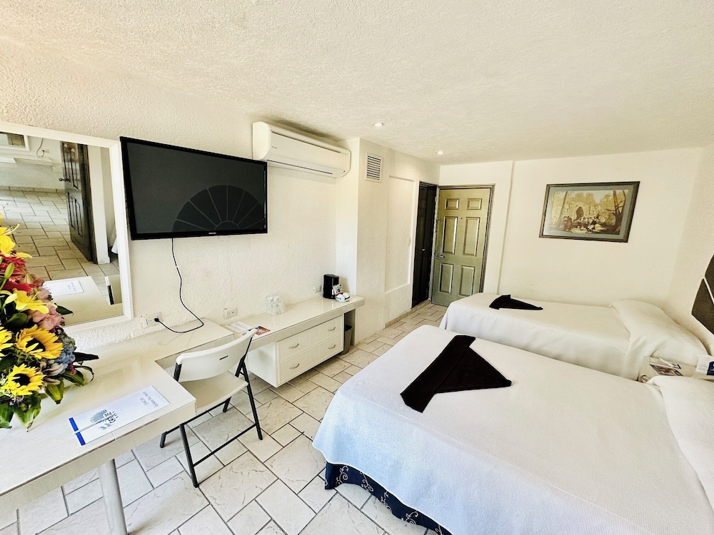 Family Quadruple Room, Multiple Beds, Non Smoking photo 3