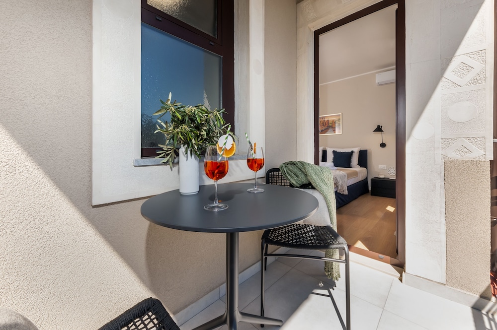 Deluxe Room, Balcony - Photo 1