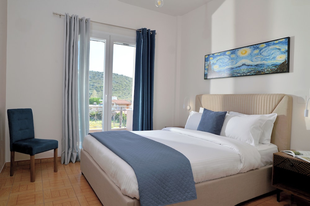 One-Bedroom Apartment with Garden and Sea View