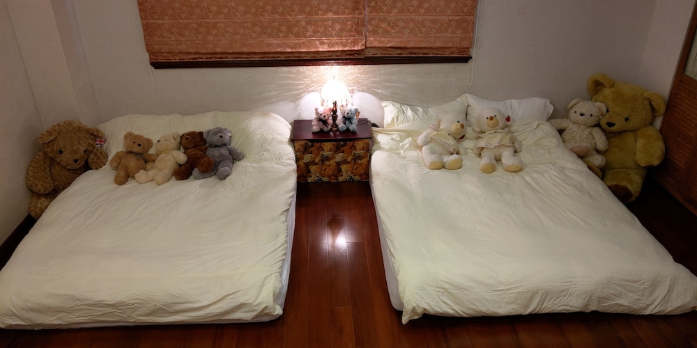 Signature Quadruple Room, 2 Double Beds, Shared Bathroom, Courtyard View photo 1