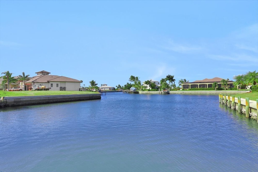 House, Multiple Beds (Quiet waterfront home with pool, dock)