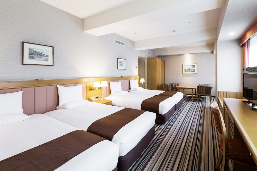 Quadruple Room, Non Smoking (Eco Plan - No Cleaning Service) photo 2