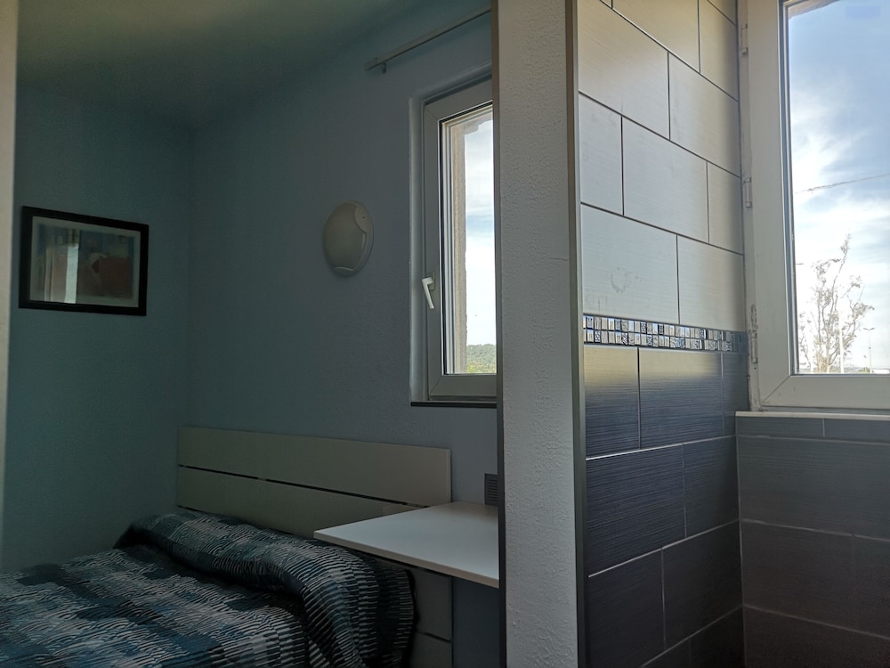 Comfort Quadruple Room, 1 Double Bed with Sofa bed, Accessible photo 2