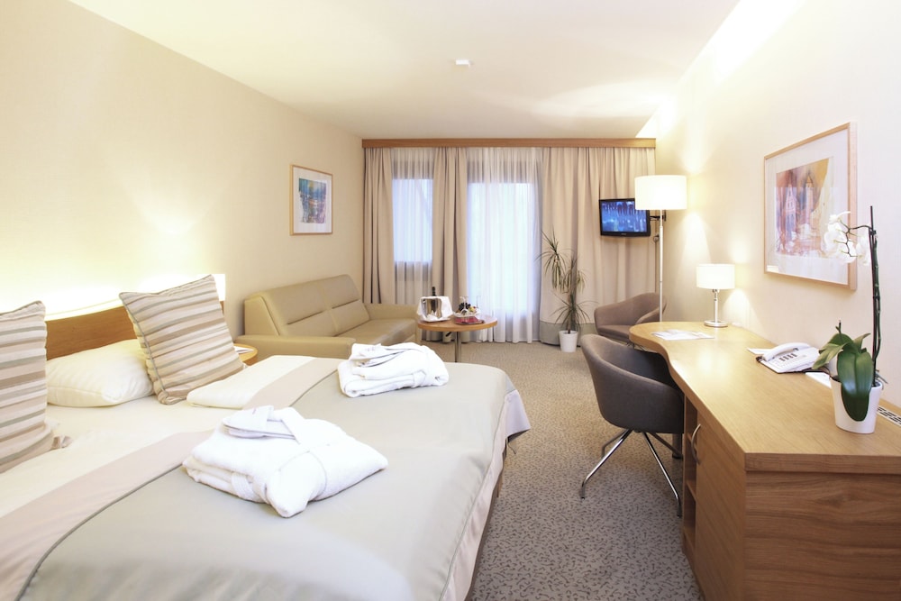 Comfort Quadruple Room, Balcony, Garden View
