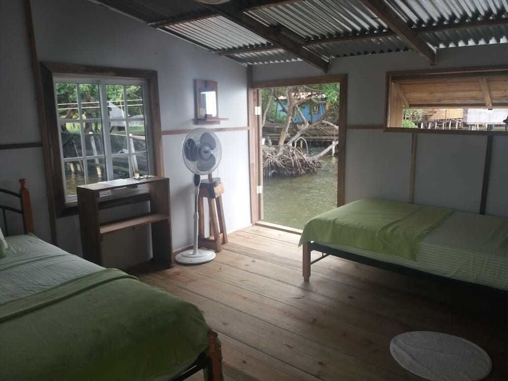 Basic Triple Room, Multiple Beds, Shared Bathroom, Sea View photo 2