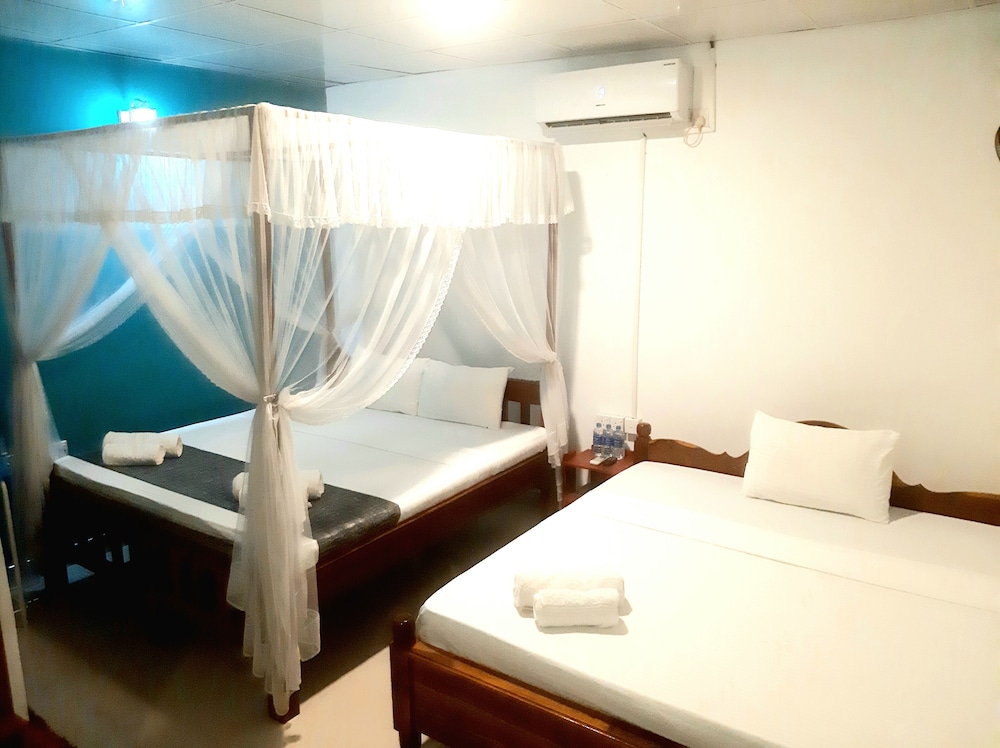 Habitación Cuádruple Deluxe