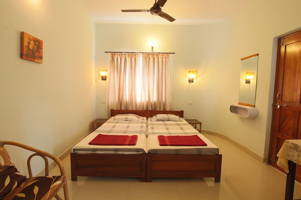 AC Twin Room with Balcony Upper Floor photo 1
