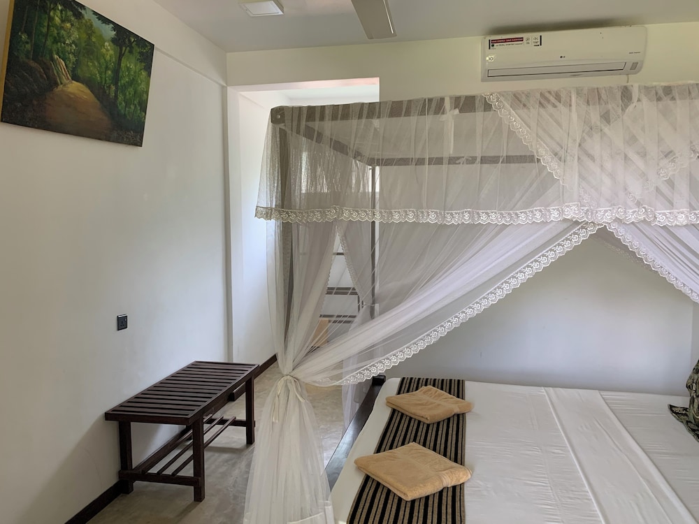 Deluxe Triple Room, Non Smoking, Garden View photo 1
