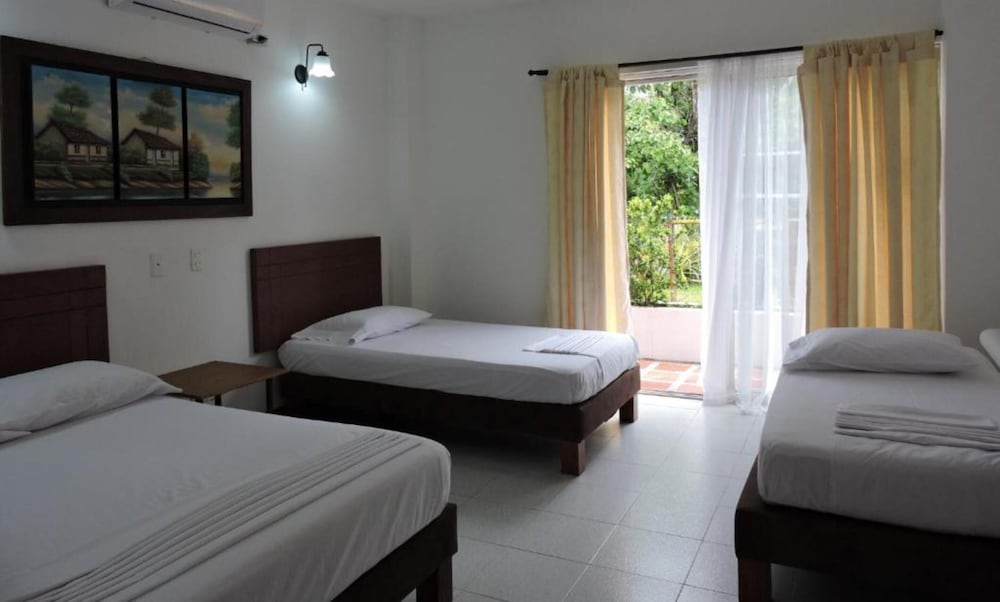 Quadruple Room, Pool View photo 1