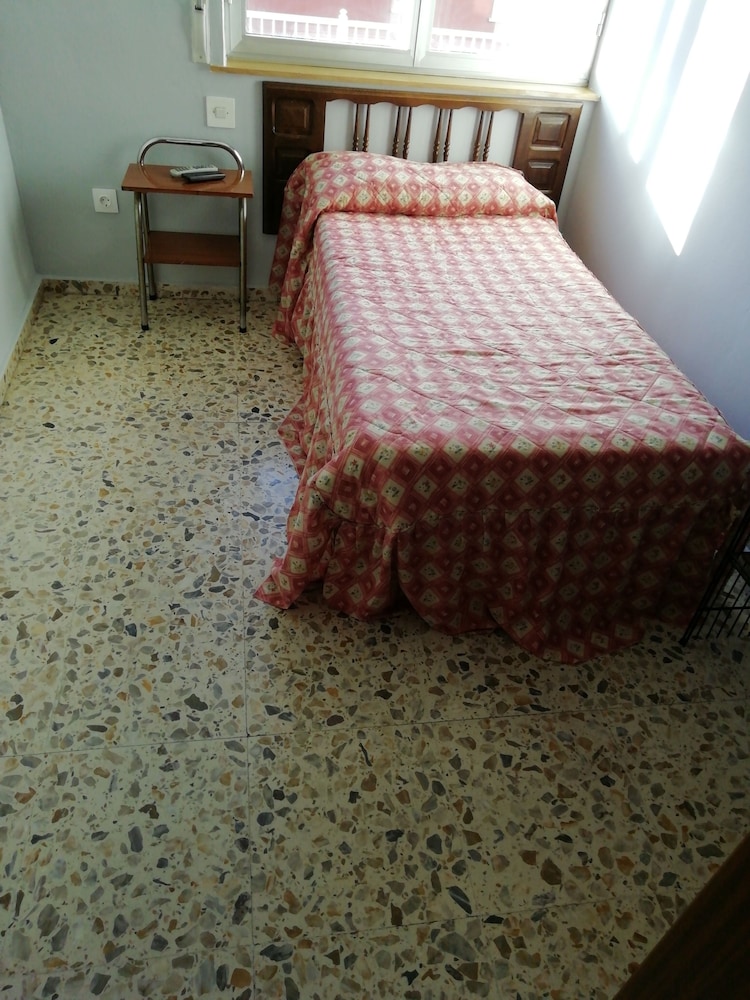 Habitación individual, baño compartido