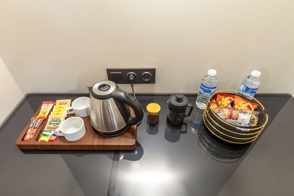 Deluxe Quadruple Room - Photo 7