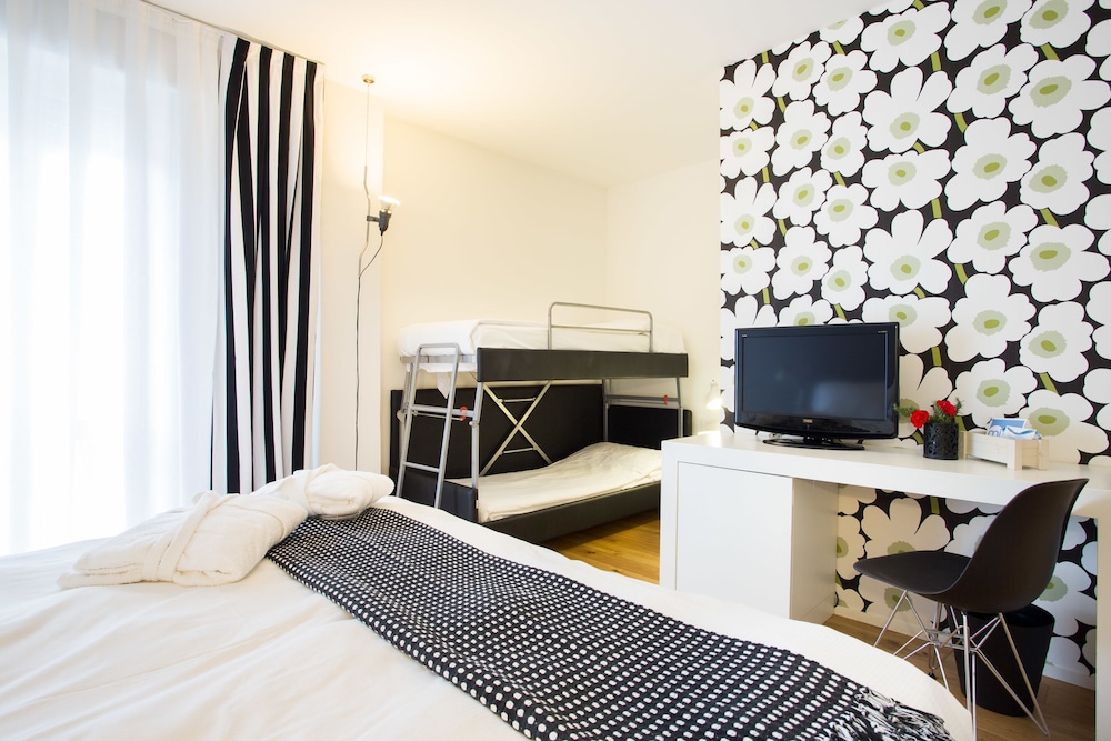 Deluxe Quadruple Room - Photo 17